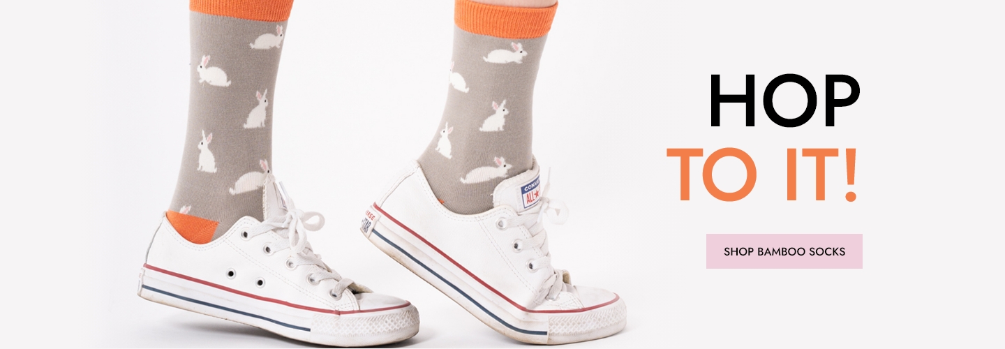 banner showing orange and grey rabbit socks and text 
